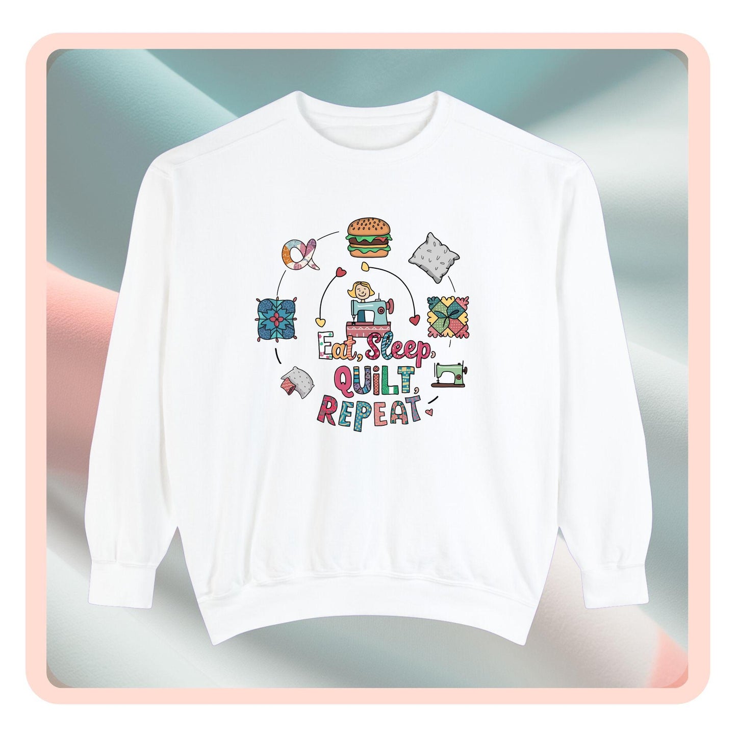 A funny Sweatshirt with the phrase Eat, Sleep, Quilt, Repeat  showing the cycle of a quilter's day with eating, sleeping, and quilting