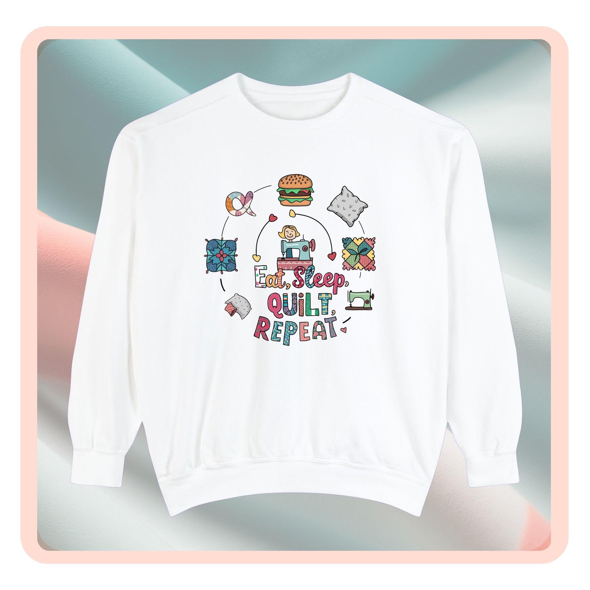 A funny Sweatshirt with the phrase Eat, Sleep, Quilt, Repeat  showing the cycle of a quilter's day with eating, sleeping, and quilting