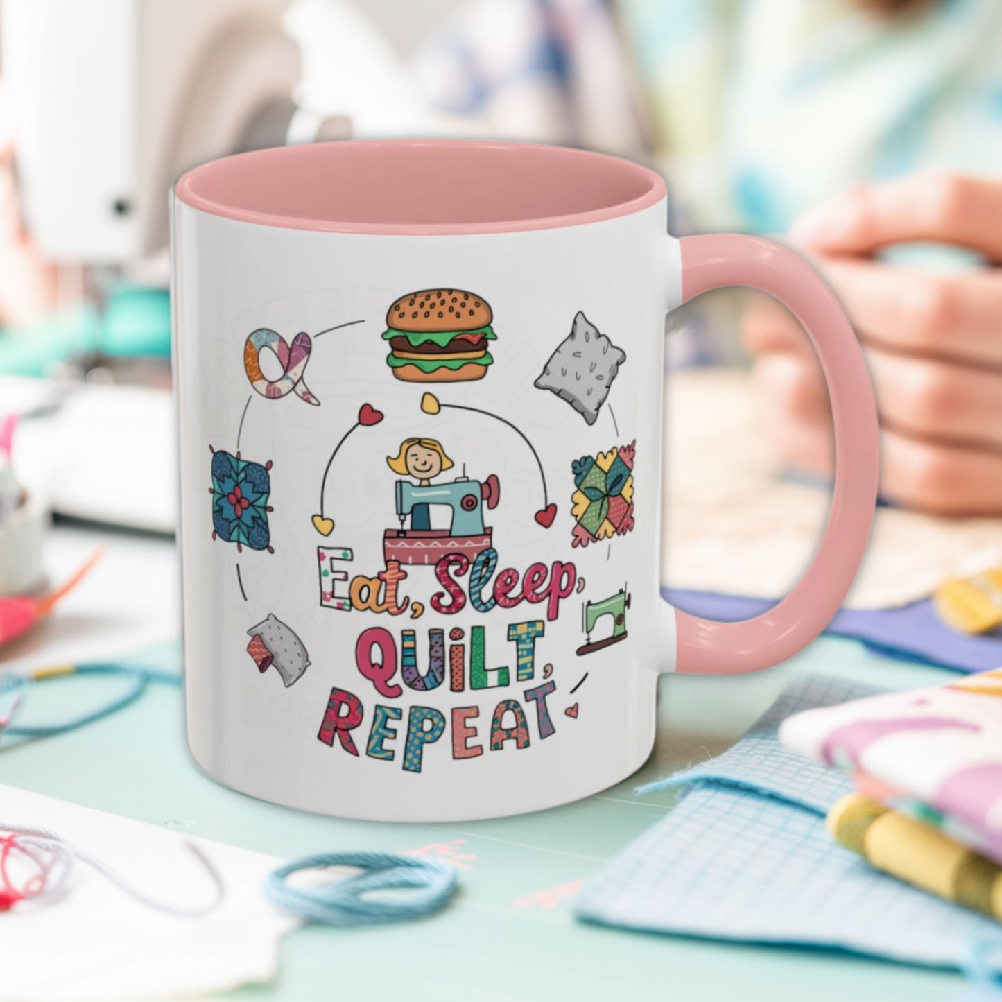 A funny Ceramic Mug with the phrase Eat, Sleep, Quilt, Repeat showing the cycle of a quilter's day with eating, sleeping, and quilting