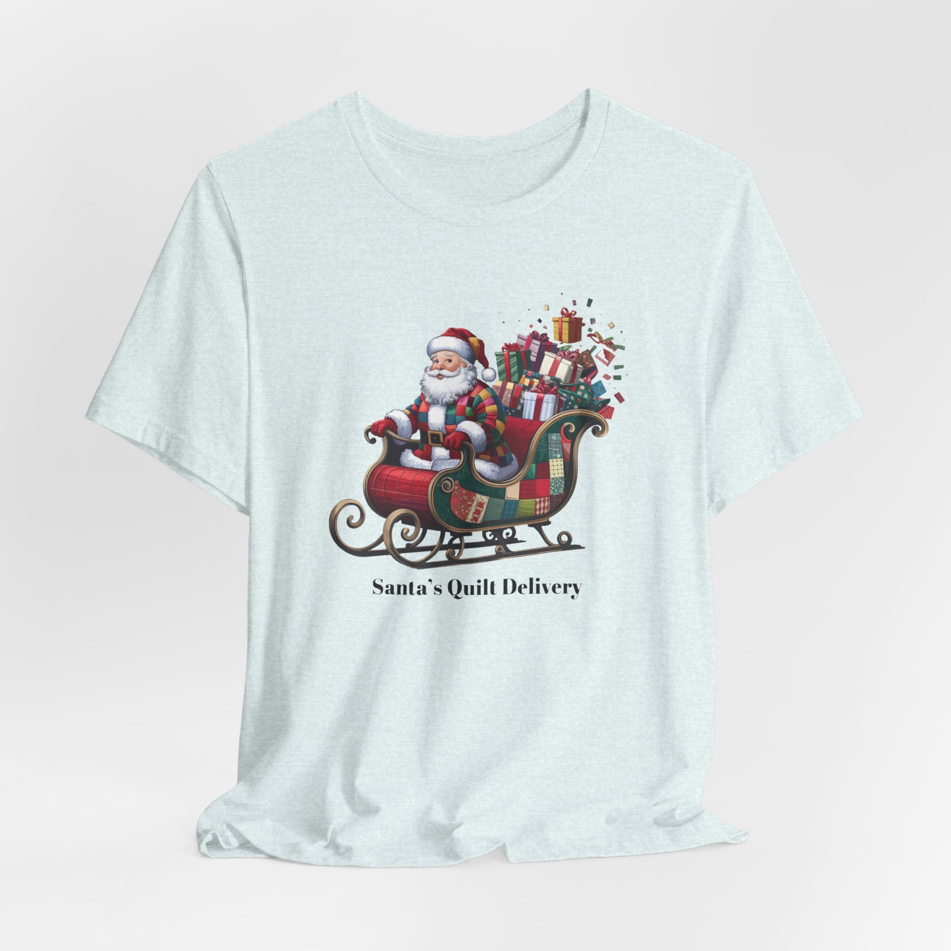 A christmas quilting t-shirt featuring Santa Claus wearing a patchwork quilt coat, sitting in a sleigh filled with gifts and quilts, with the phrase "Santa's Quilt Delivery" below, combining holiday cheer and quilting fun.