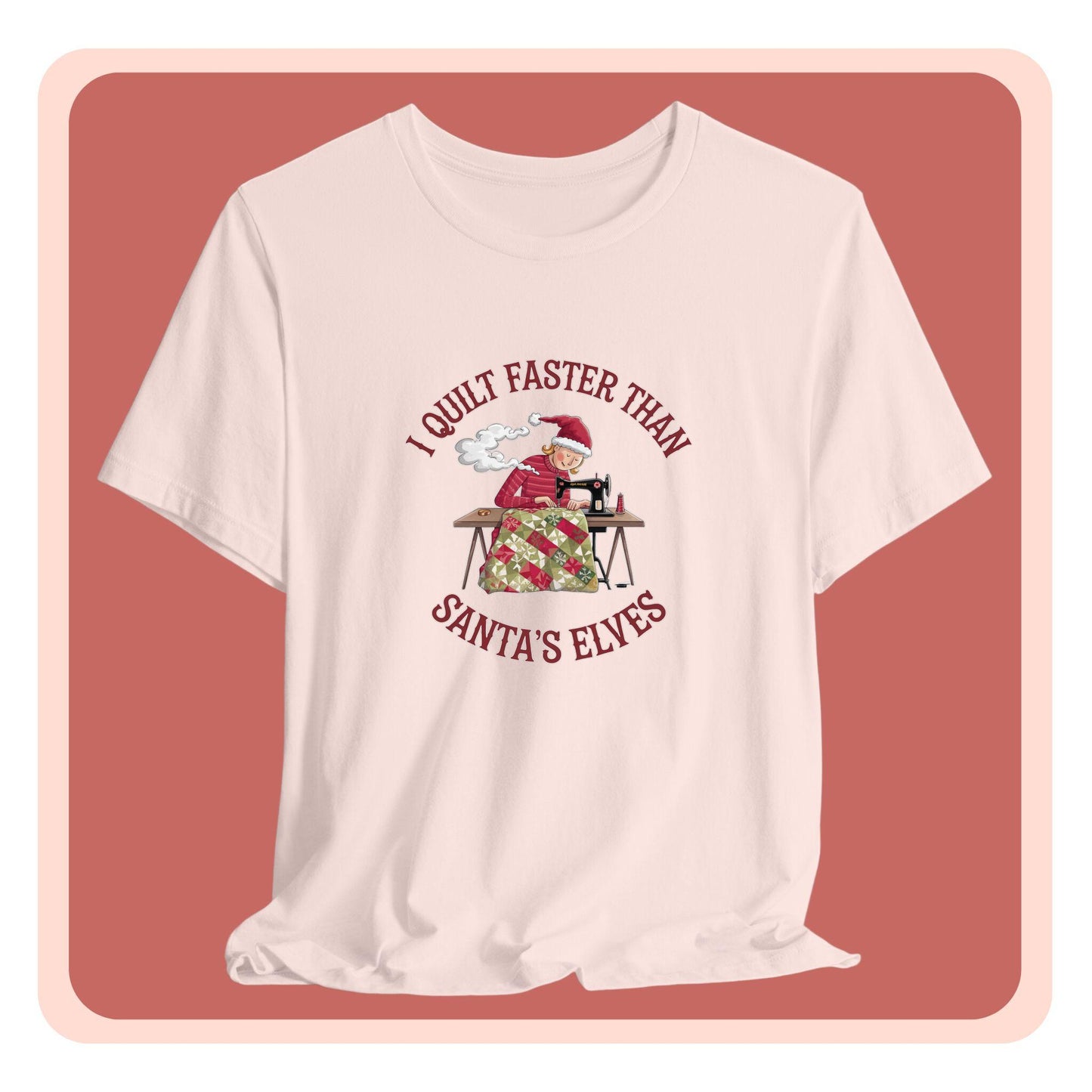 A christmas quilting t-shirt featuring a quilter working at a sewing machine, quilting a festive holiday quilt, with the phrase "I Quilt Faster Than Santa's Elves" above the image, highlighting the speed and skill of the quilter.