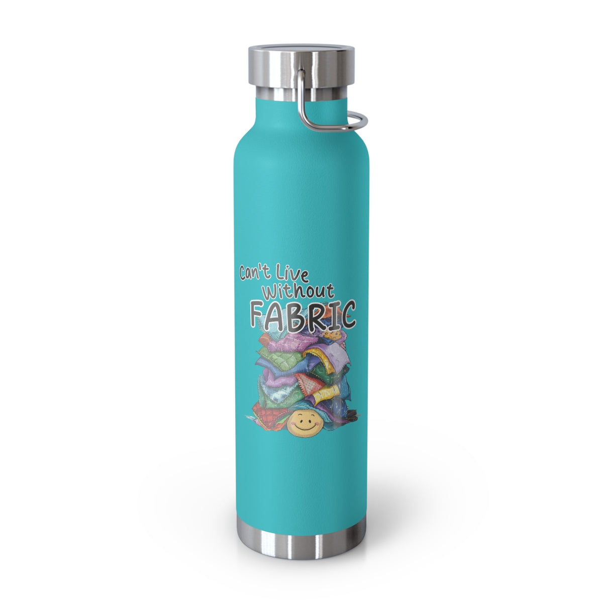A Mint Green funny quilting-inspired Insulated Bottle with a cute illustration showing a happy face under a pile of multicolored fabric pieces. Hand-lettered text says "Can't Live Without Fabric". The fabrics display various patterns and textures.