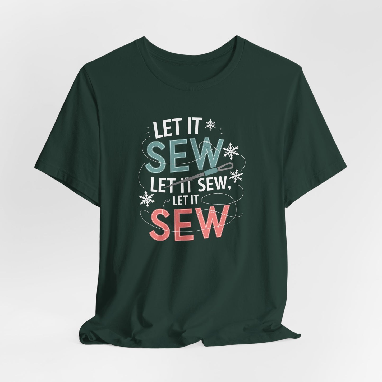 A Forest christmas quilting t-shirt featuring the phrase "Let it Sew, Let it Sew, Let it Sew" featuring a needle and thread weaving through the letters, accented by snowflakes to bring out the holiday theme.