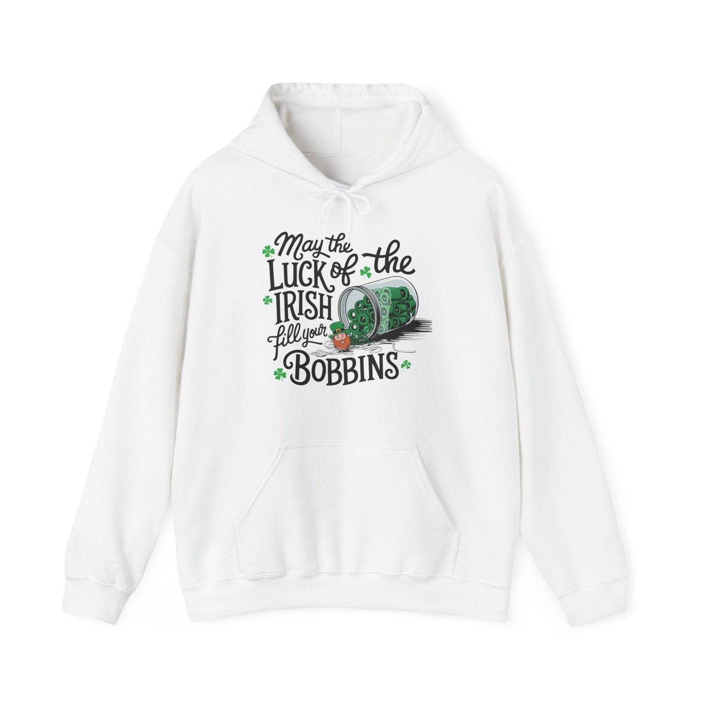 A White hoodie featuring a festive design with shamrocks, a spool of green thread, and the phrase 'May the Luck of the Irish Fill Your Bobbins,' perfect for quilters celebrating St. Patrick’s Day.