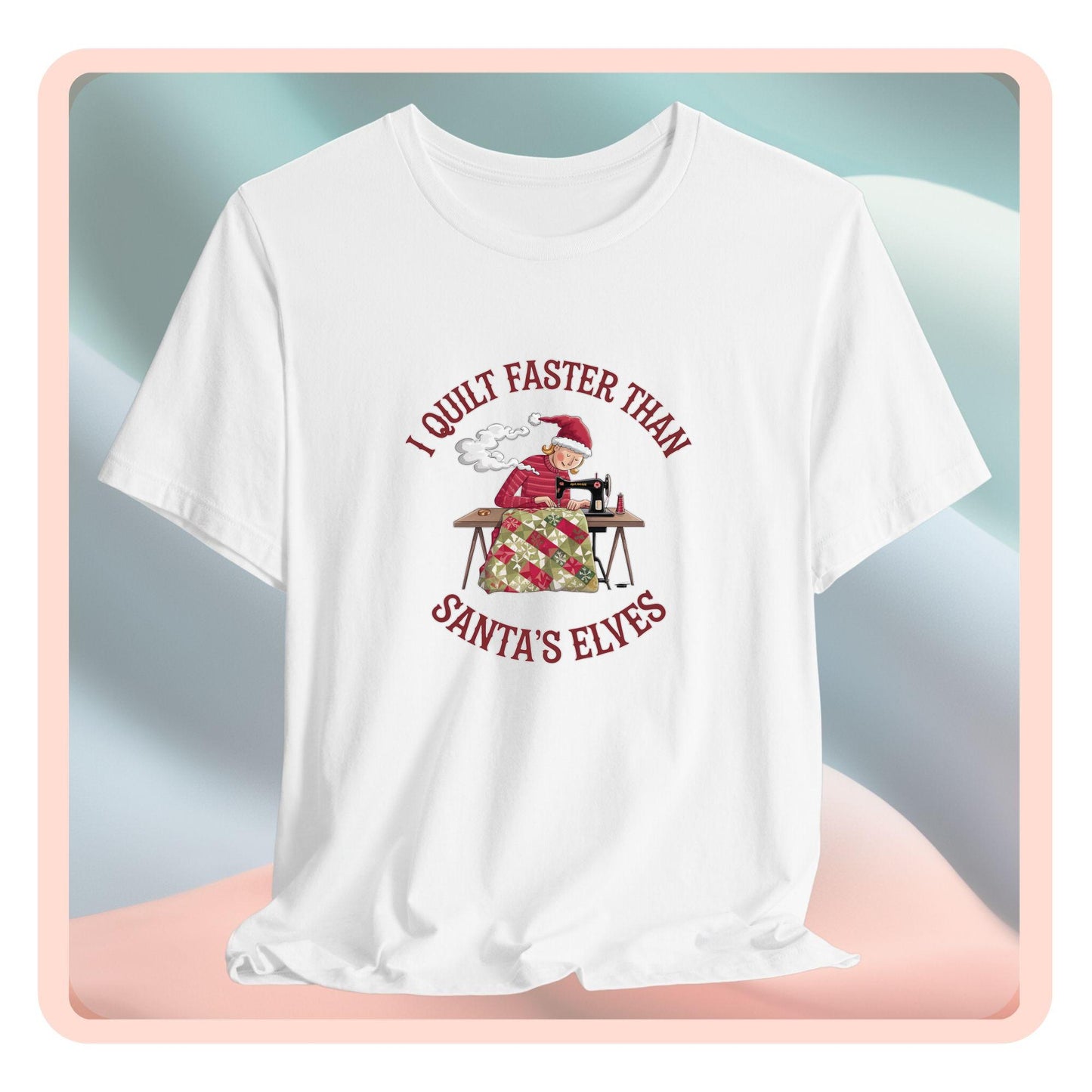 A christmas quilting t-shirt featuring a quilter working at a sewing machine, quilting a festive holiday quilt, with the phrase "I Quilt Faster Than Santa's Elves" above the image, highlighting the speed and skill of the quilter.