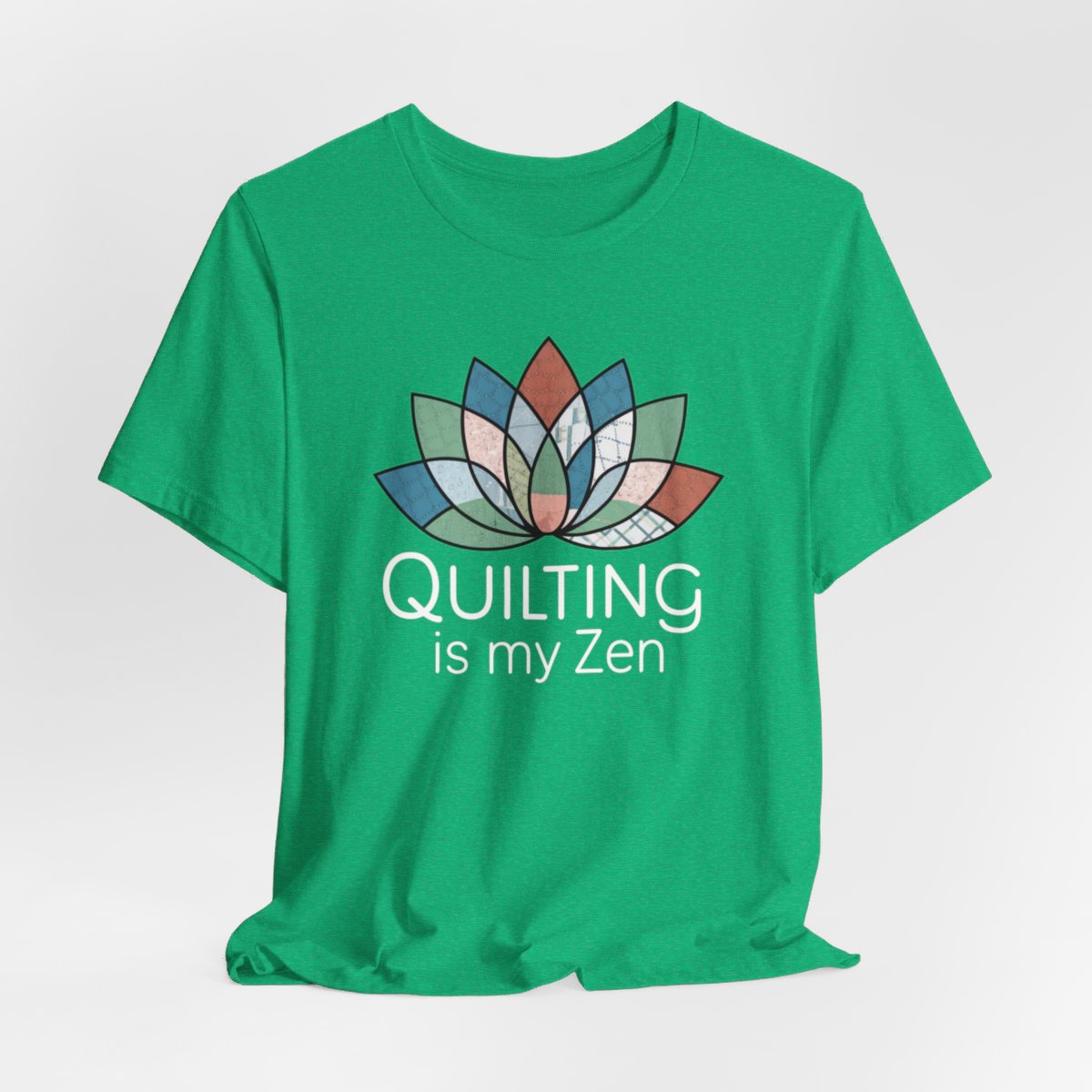 A Heather Kelly funny quilting T-Shirt with the phrase Quilting is my Zen on a quilting-themed t-shirt with a lotus flower design made of various quilt patterns and textures.