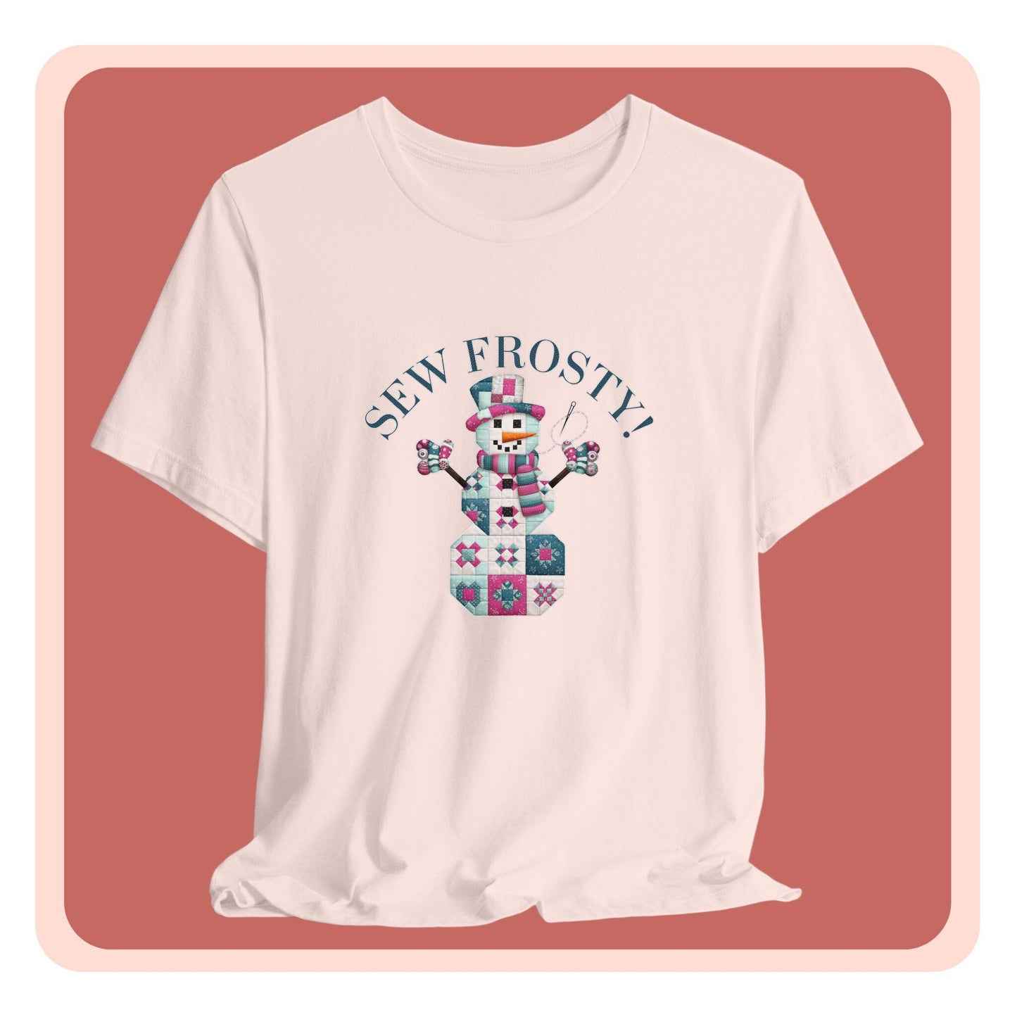 A christmas quilting t-shirt featuring cute snowman made of patchwork quilt blocks with the phrase "Sew Frosty" above, holding a needle to highlight the quilting theme.