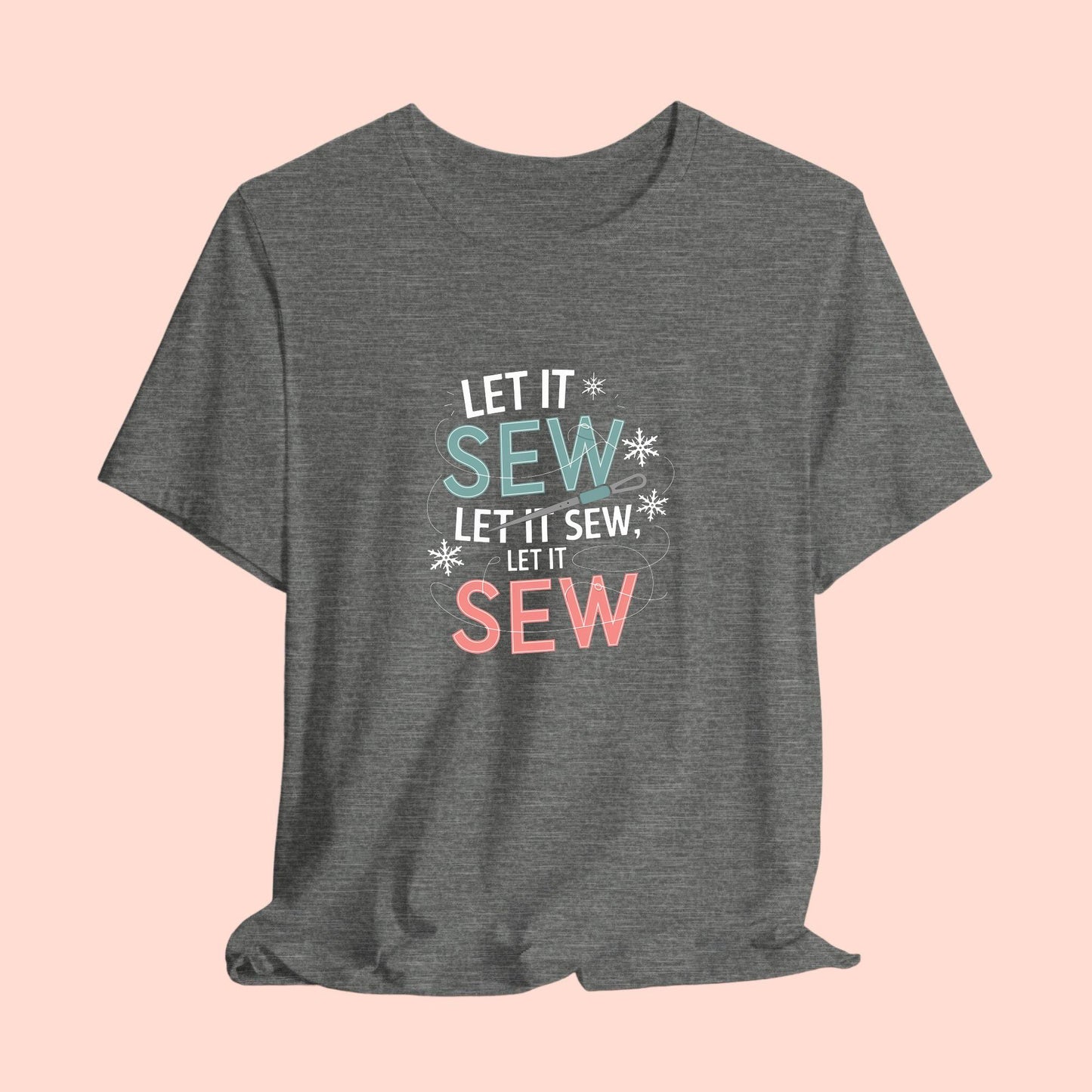 A christmas quilting t-shirt featuring the phrase "Let it Sew, Let it Sew, Let it Sew" featuring a needle and thread weaving through the letters, accented by snowflakes to bring out the holiday theme.