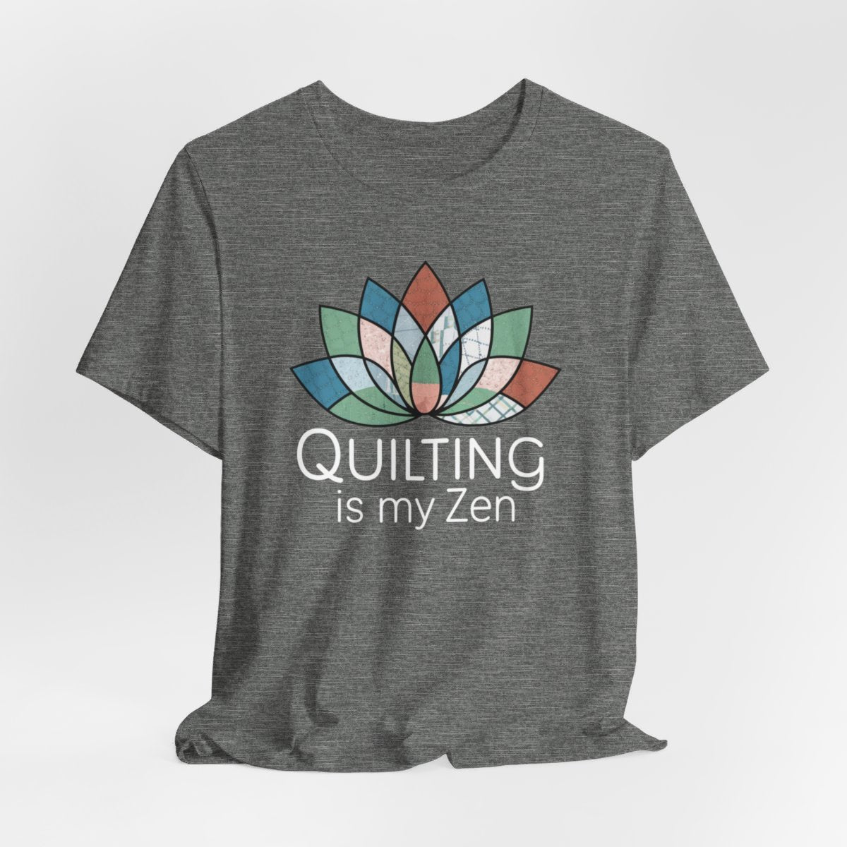 A Deep Heather funny quilting T-Shirt with the phrase Quilting is my Zen on a quilting-themed t-shirt with a lotus flower design made of various quilt patterns and textures.