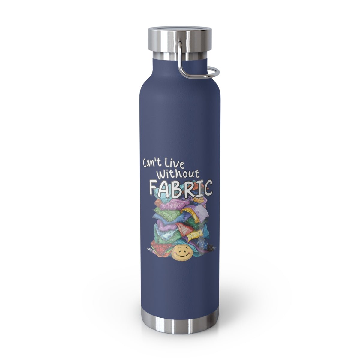A Navy funny quilting-inspired Insulated Bottle with a cute illustration showing a happy face under a pile of multicolored fabric pieces. Hand-lettered text says "Can't Live Without Fabric". The fabrics display various patterns and textures.
