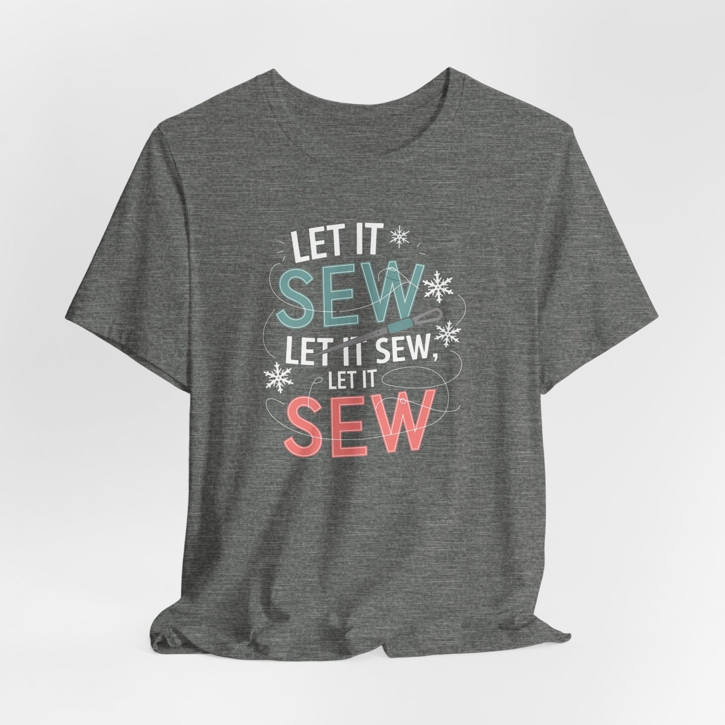 A Deep Heather christmas quilting t-shirt featuring the phrase "Let it Sew, Let it Sew, Let it Sew" featuring a needle and thread weaving through the letters, accented by snowflakes to bring out the holiday theme.
