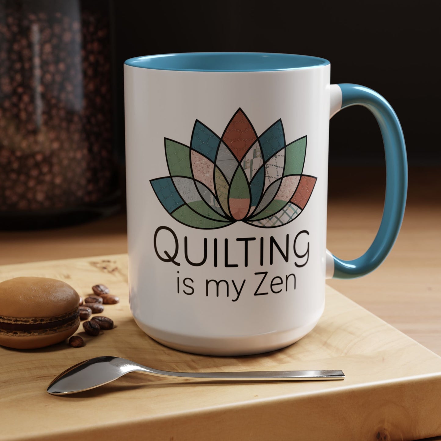 A funny Ceramic Mug with the phrase Quilting is my Zen on a quilting-themed t-shirt with a lotus flower design made of various quilt patterns and textures.