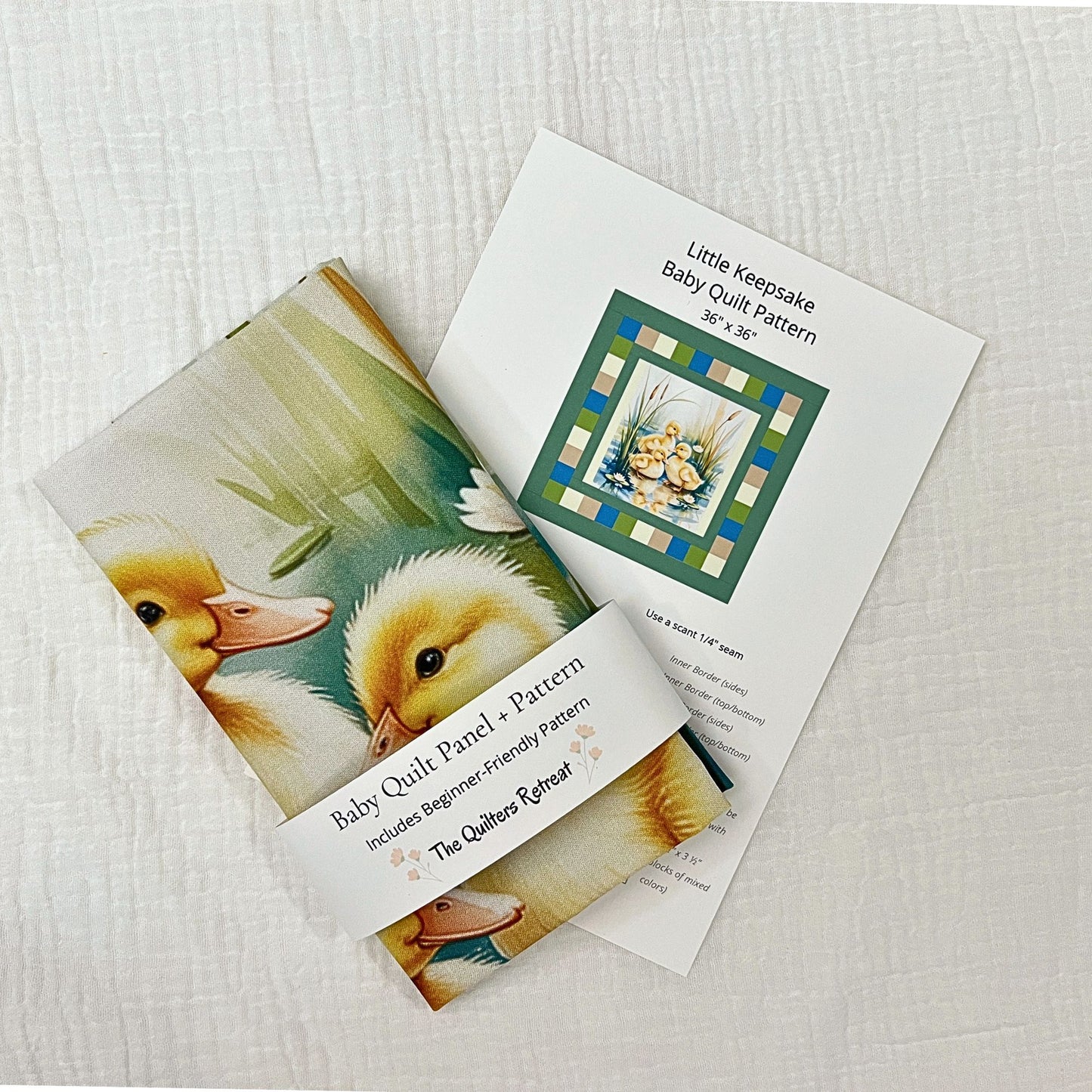 Marsh ducklings baby quilt panel with beginner-friendly pattern, folded with pattern card — handmade baby shower gift