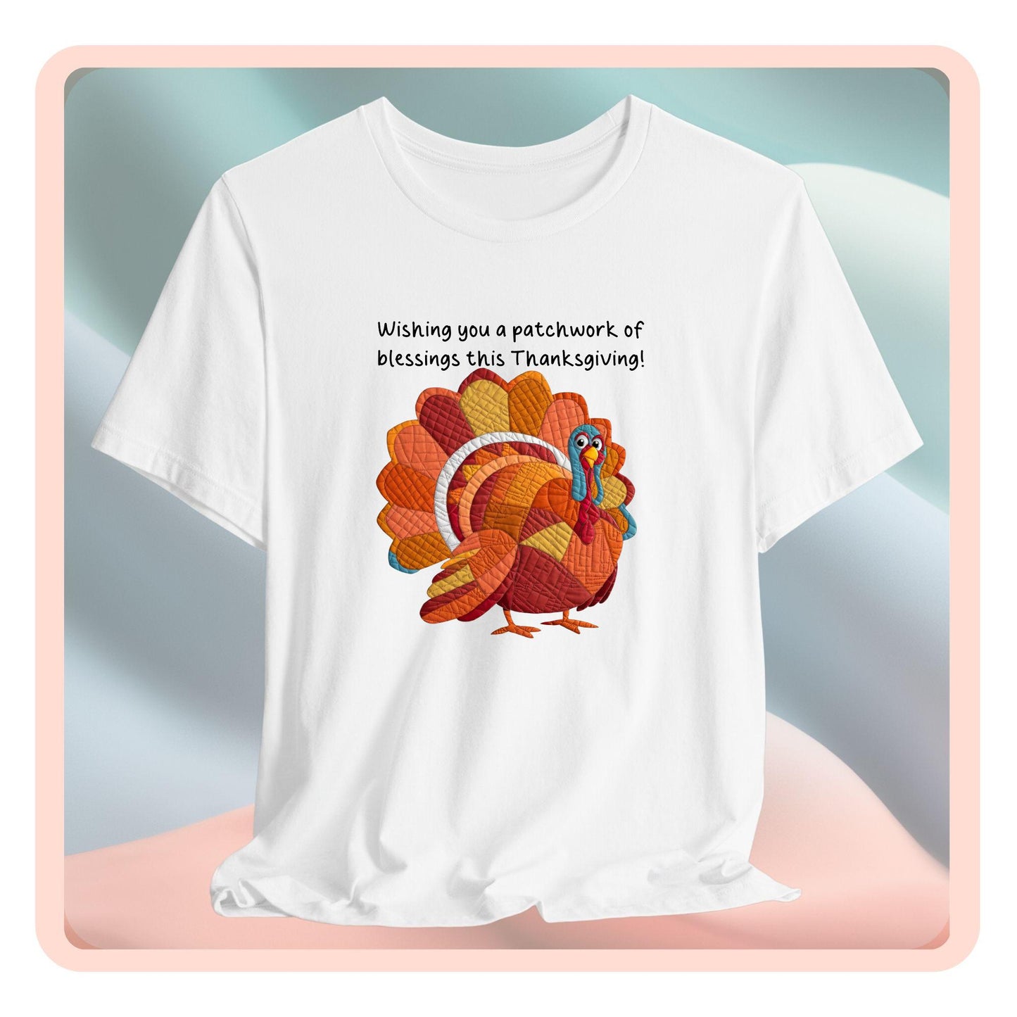 A thanksgiving quilting t-shirt featuring a quilted patchwork turkey in autumn colors with text "Wishing you a patchwork of blessings this Thanksgiving!" Turkey features various quilt patterns and textures in shades of orange, red, yellow, and blue. Whimsical, crafty holiday design perfect for quilting enthusiasts.