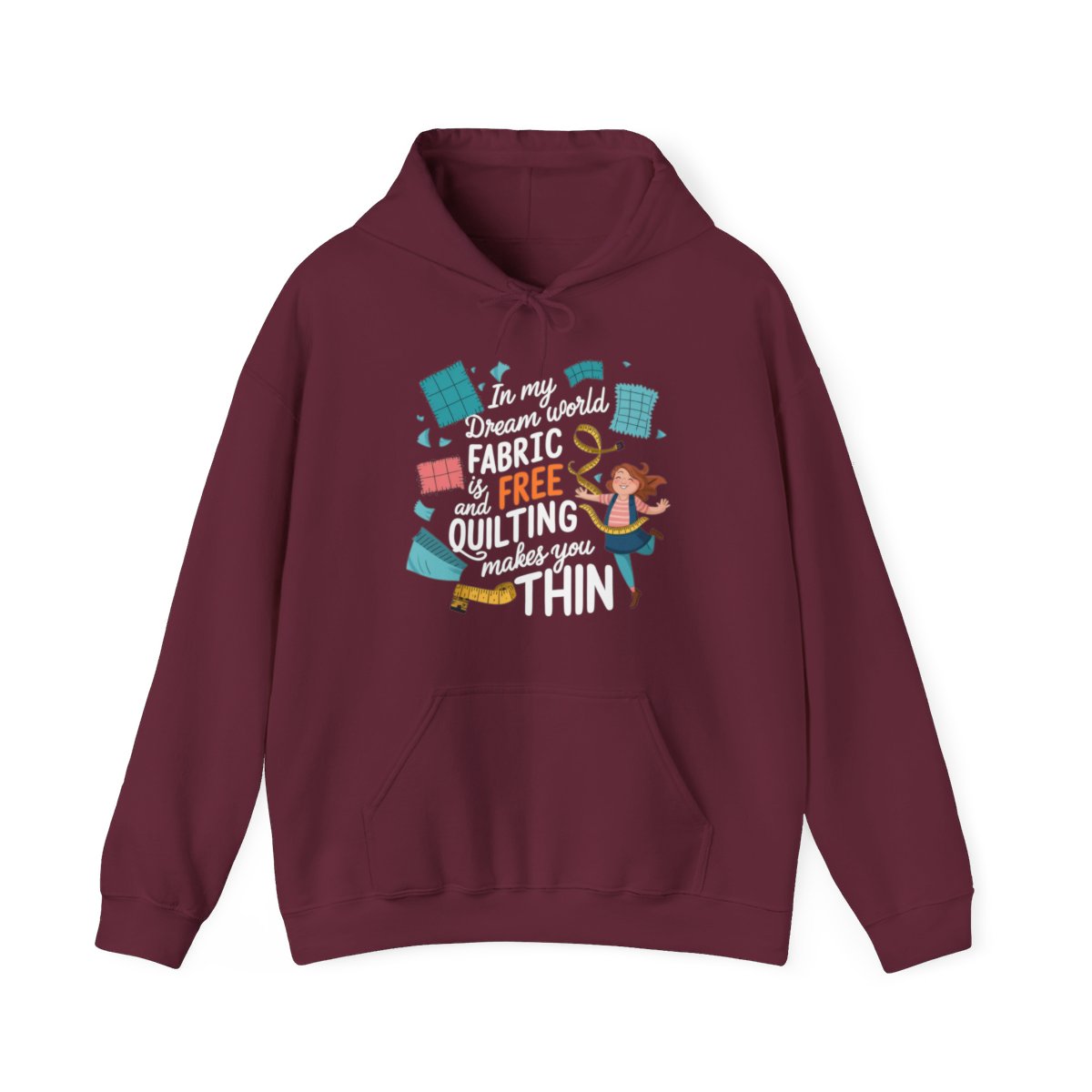 A Maroon funny Hoodie with the phrase Fabric is Free and Quilting Makes You Thin in font with a cheerful quilter jumping for joy