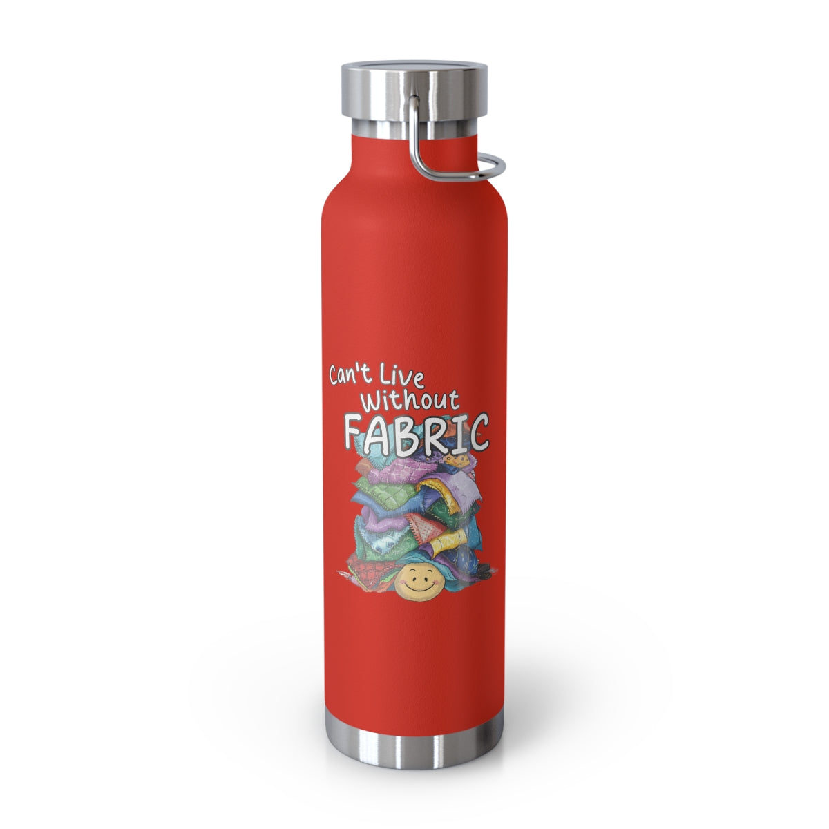 A Red funny quilting-inspired Insulated Bottle with a cute illustration showing a happy face under a pile of multicolored fabric pieces. Hand-lettered text says "Can't Live Without Fabric". The fabrics display various patterns and textures.