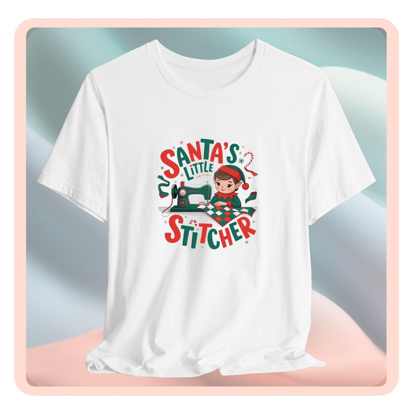 A christmas quilting t-shirt featuring an adorable elf is sewing a festive patchwork quilt on a sewing machine, surrounded by holiday-themed decorations, with the phrase "Santa's Little Stitcher" above and below the design.