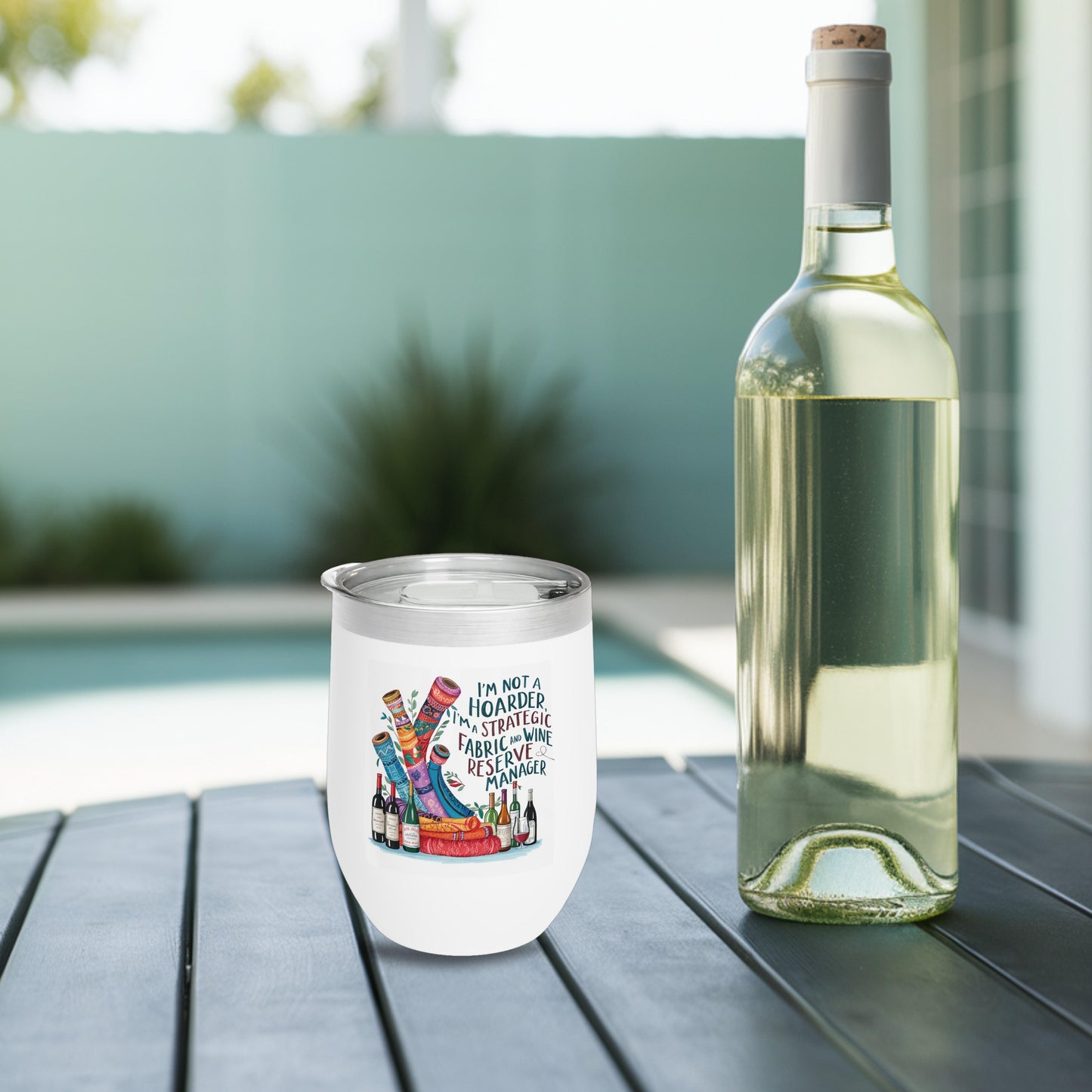 A funny quilting-inspired wine tumbler with a design of wine bottles with funny quilting related sayings,  The perfect gift for quilters.