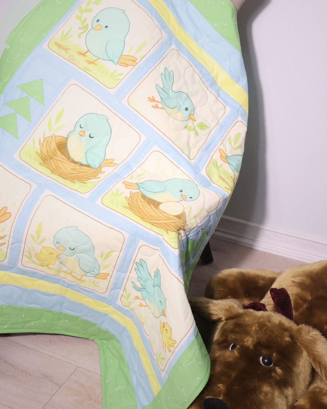 Close detail of the Little Birdie bluebird nursery quilt