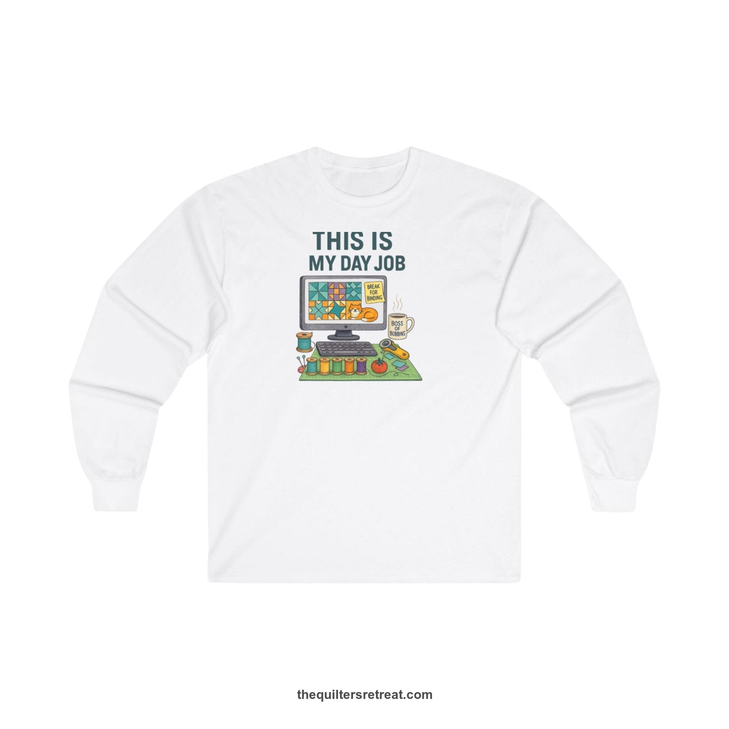 A White Long Sleeve T-Shirt with a computer quilt design, cat illustration, "THIS IS MY DAY JOB" text with sewing tools, playful style