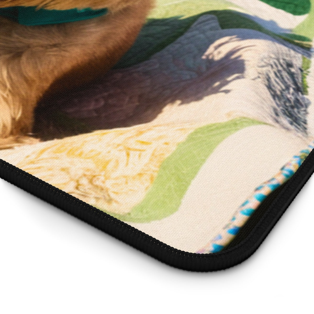 A quilting inspired Desk pad design showing a terrier puppy sitting on a colorful spring-themed quilt with various flower patterns. The quilt features pink, yellow, and green patches with intricate floral designs, creating a cheerful and vibrant workspace accessory. Perfect gift for quilters.