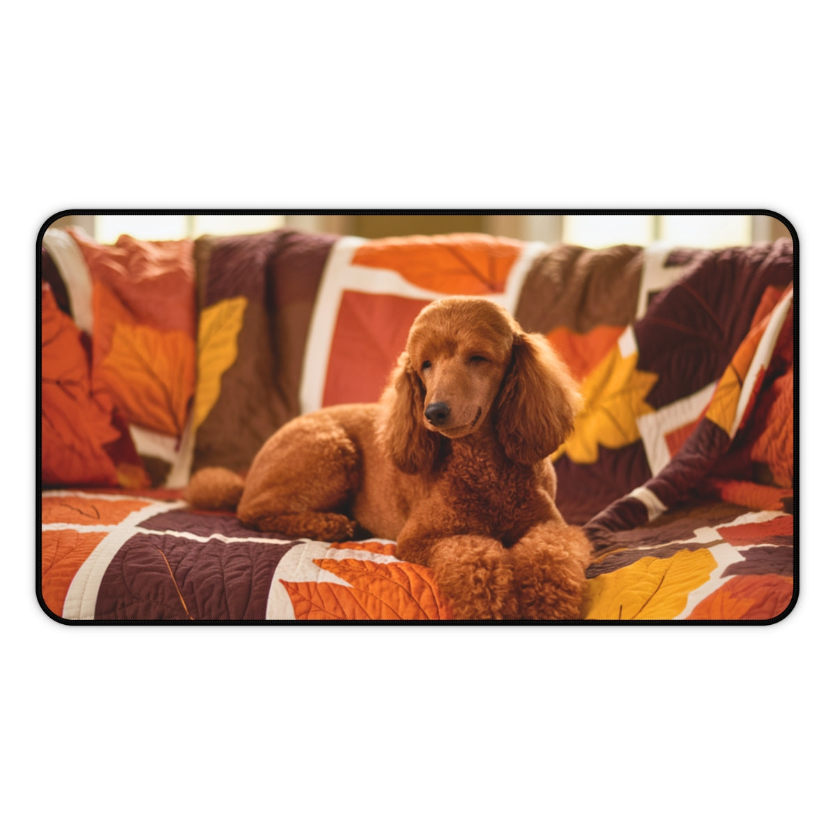 A quilting inspired Desk pad design depicting a brown poodle resting on an autumn-themed quilt. The quilt features warm colors like orange, red, and brown, with intricate leaf patterns, creating a cozy and inspiring fall atmosphere for your workspace. Perfect gift for quilters.