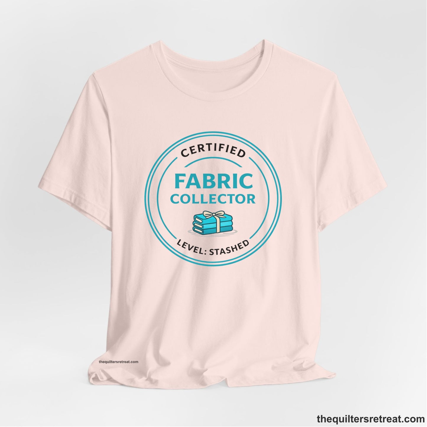 A Short Sleeve T-Shirt featuring a playful design about fabric collecting.