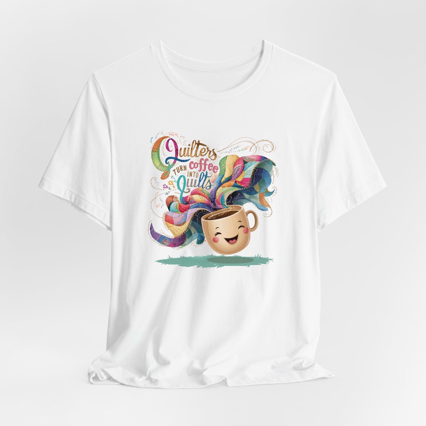 A White Short Sleeve T-Shirt with a quirky "Quilters Turn Coffee into Quilts" text with vibrant swirling patterns