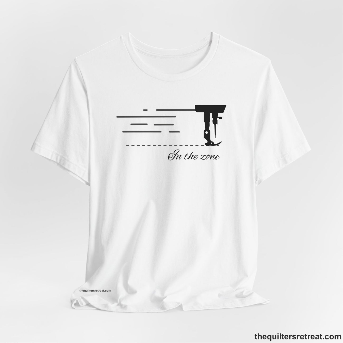 A White Short Sleeve T-Shirt with a vintage sewing machine illustration with floral accents and "Sewing Mends the Soul" text