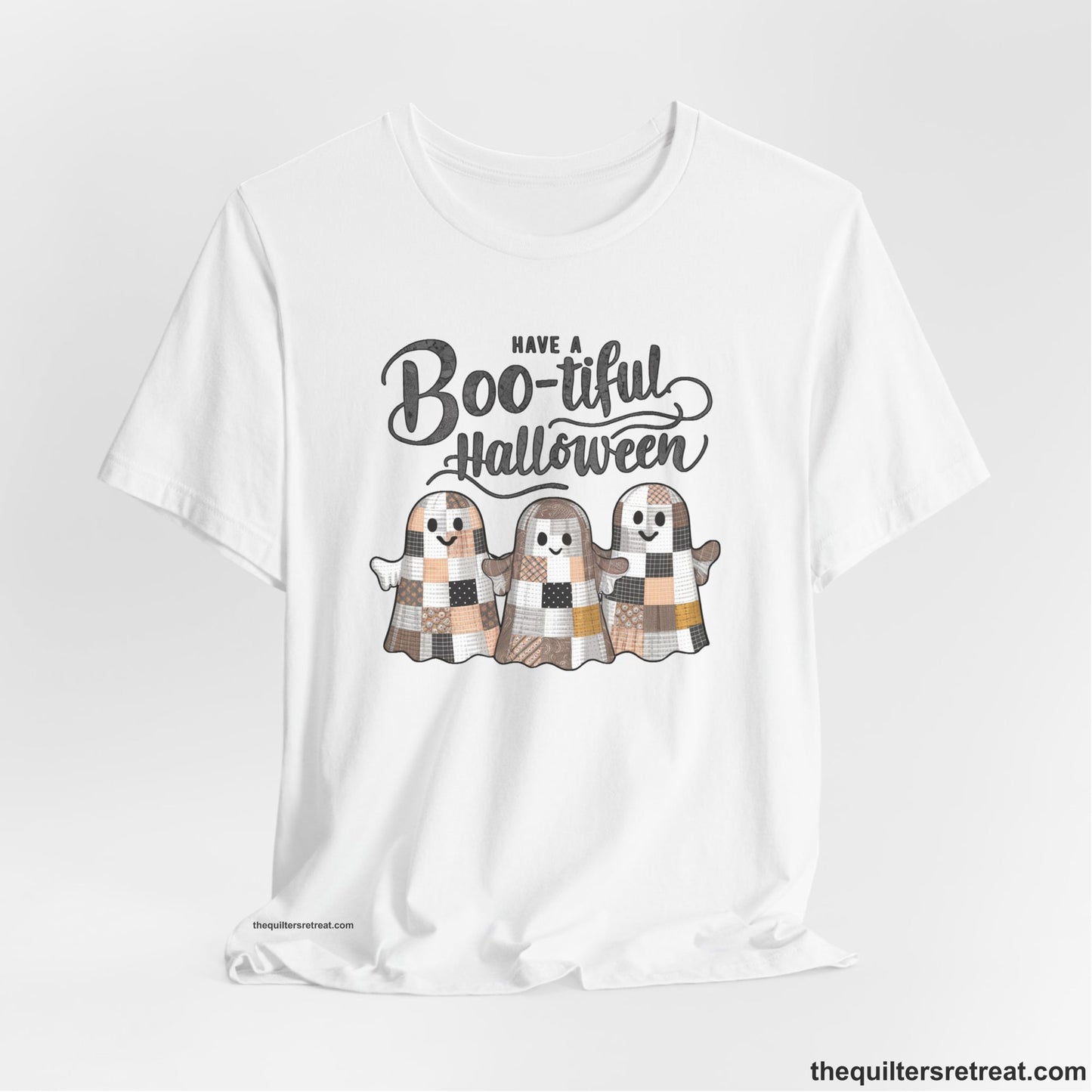 A White Short Sleeve T-Shirt with a cute patchwork ghosts with "Boo-tiful Halloween" text in a playful style