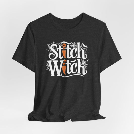 T-shirt design with "Stitch Witch" text in Halloween-themed typography. Jack-o'-lanterns, spiderwebs, and bats decorate the letters. The "i" in "Stitch" resembles a sewing needle. Ideal for quilters who love Halloween.