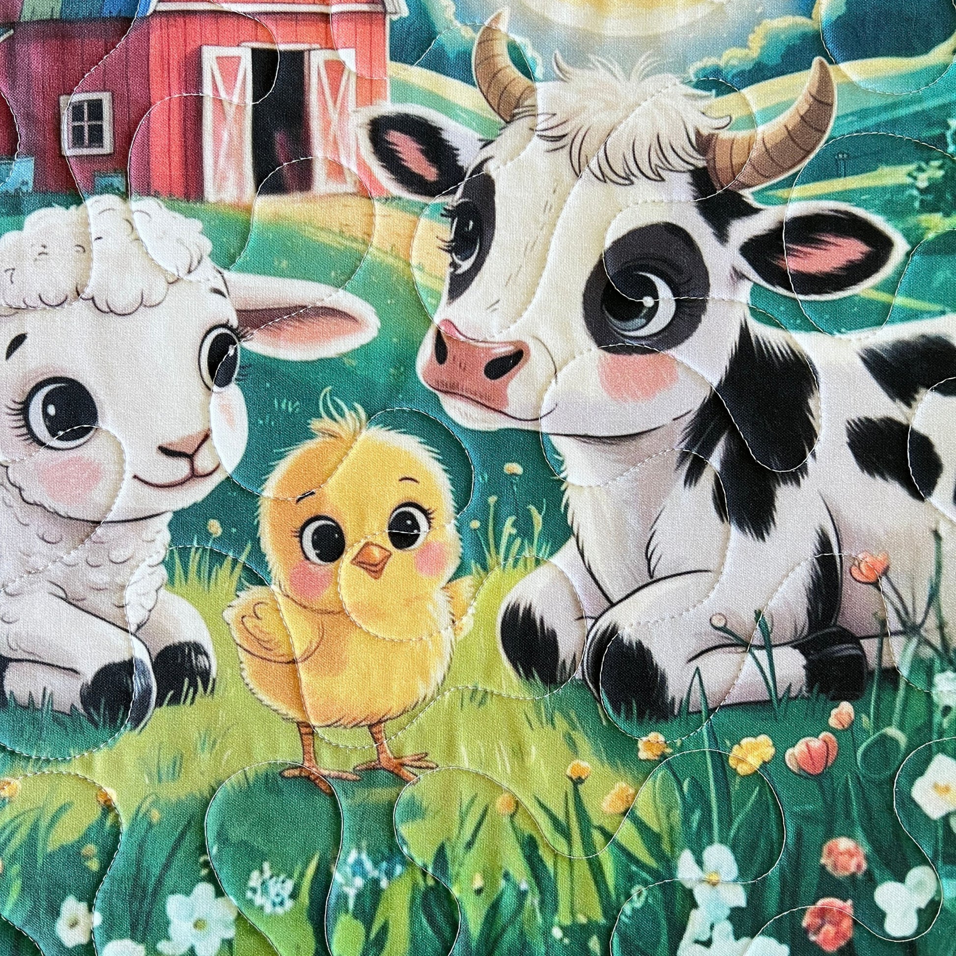 Close-up of the farm friends baby quilt panel — quilted farm animals