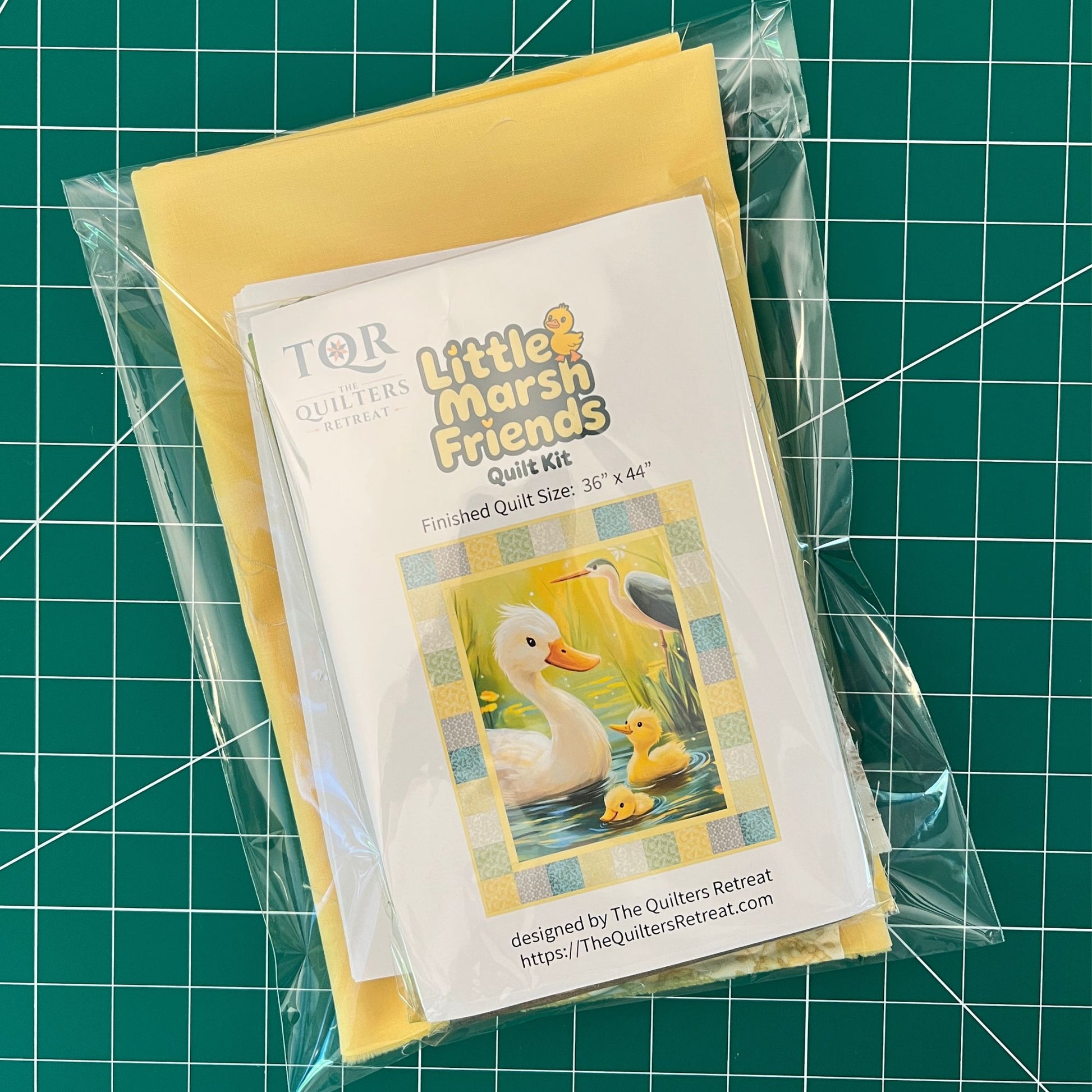 Packaged Little Marsh Friends baby quilt kit — duck panel and folded coordinating fabrics, finished 36x44 inches