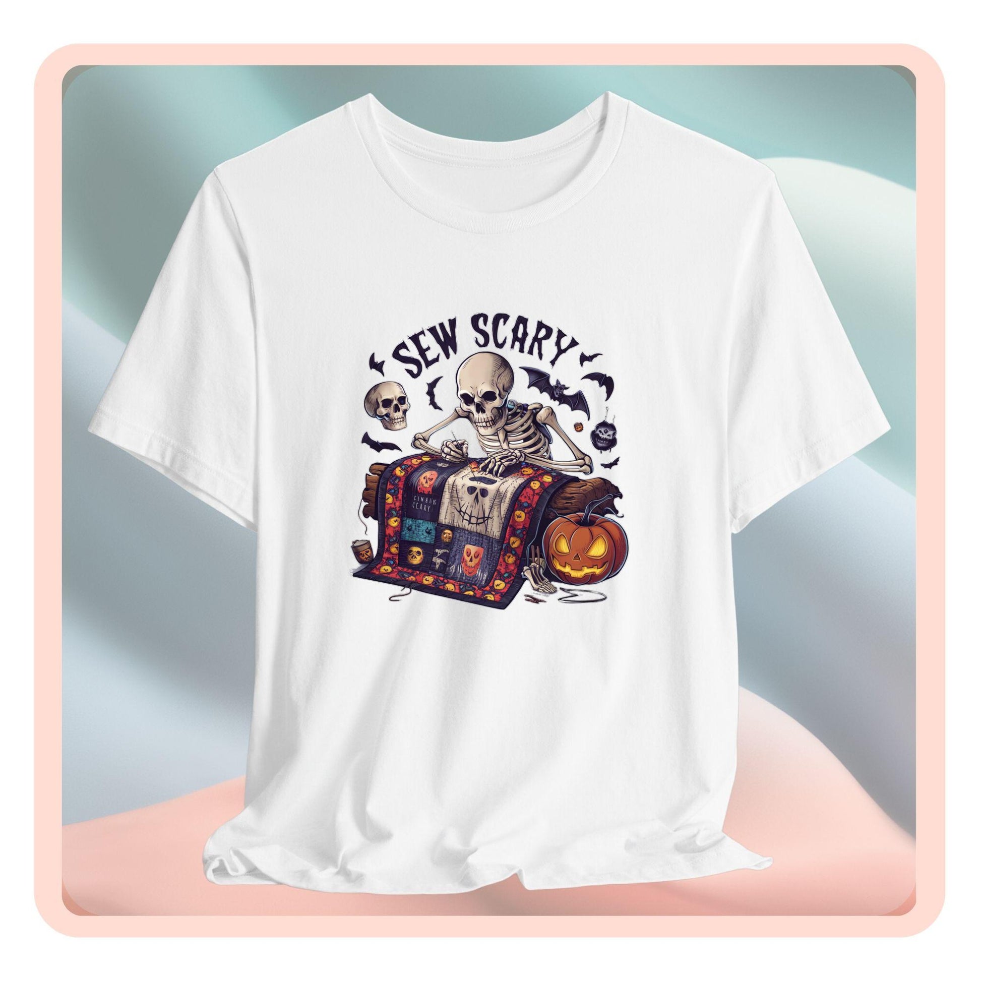 A Halloween Quilting T-Shirt featuring a skeleton sewing Halloween quilt. Colorful patchwork with spooky motifs. Bats and pumpkins surround skeleton. Text reads "Sew Scary". Ideal for quilters who love Halloween.