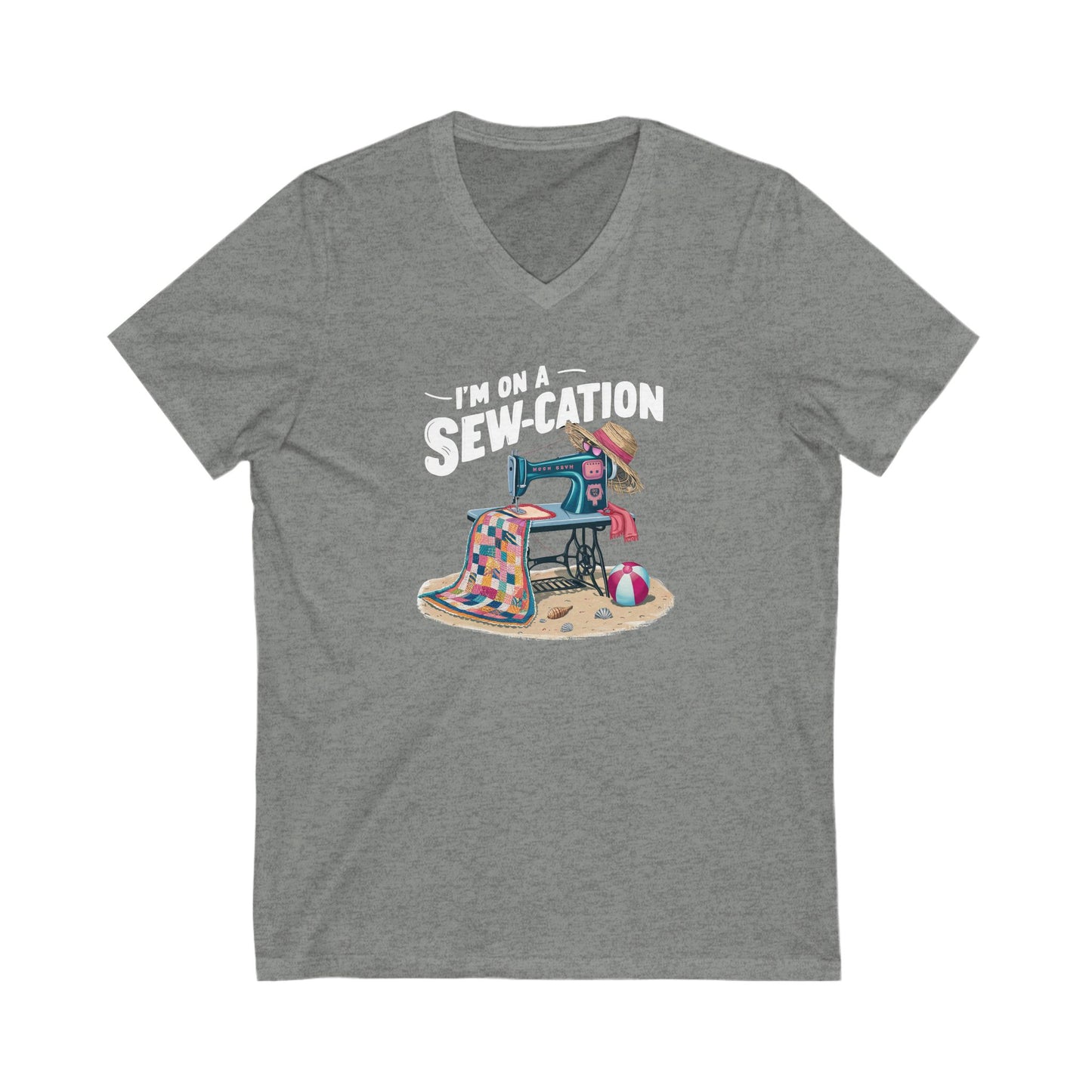 Gray t-shirt with a graphic of a sewing machine and text 'I'm on a Sew-cation' on a white background