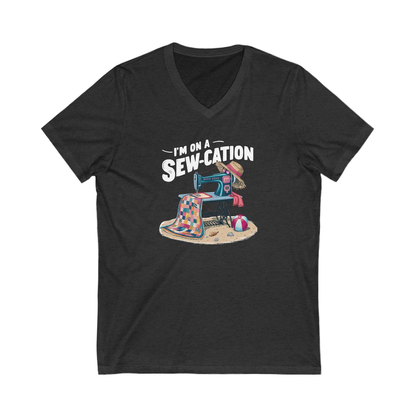 Dark Heather t-shirt with a graphic design of a sewing machine and text 'I'm on a Sew-cation' on a white background.