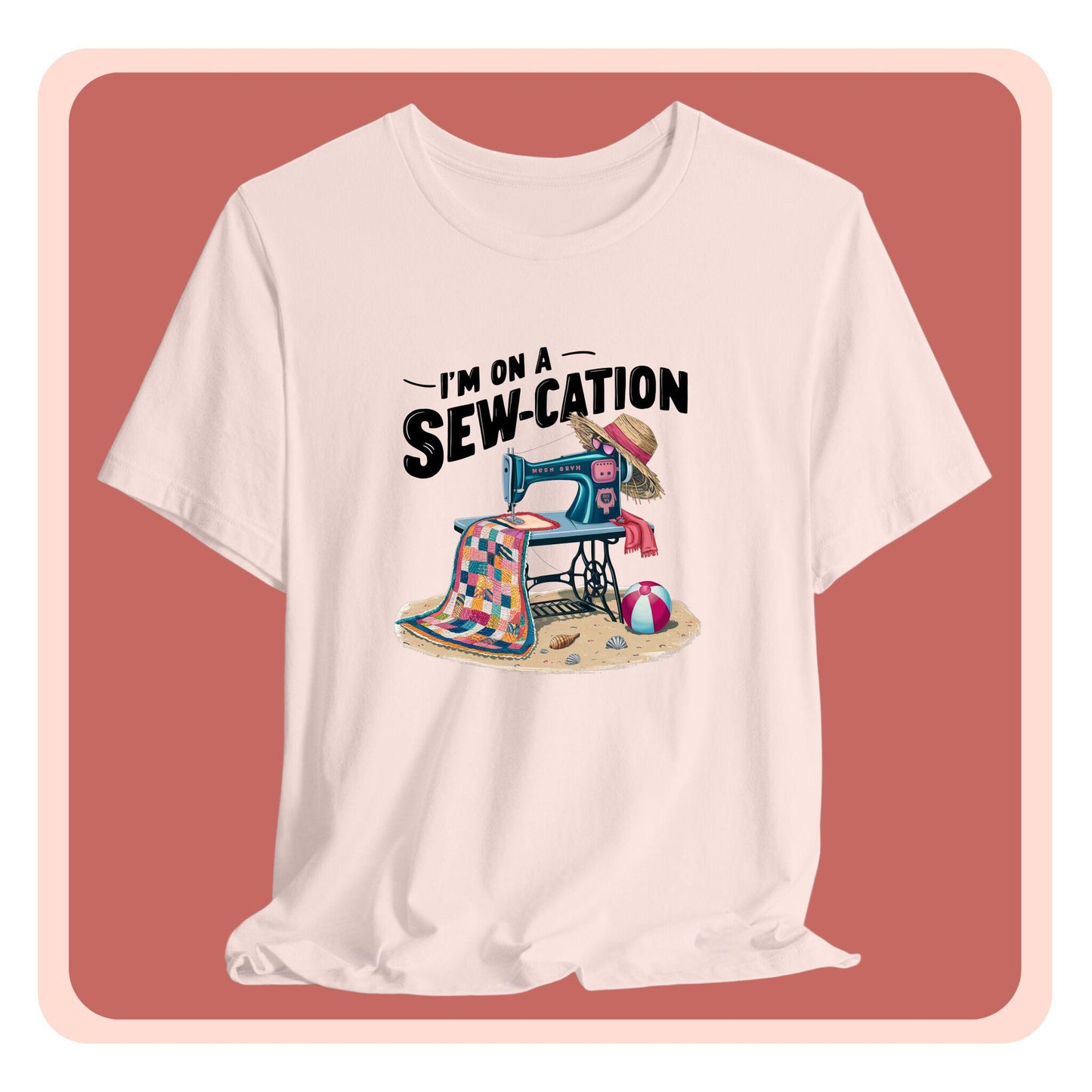 A fun Quilting T-shirt of a vintage sewing machine on a beach with a colorful quilt, sun hat, and beach ball. Text above reads "I'm on a Sew-cation" in bold letters.