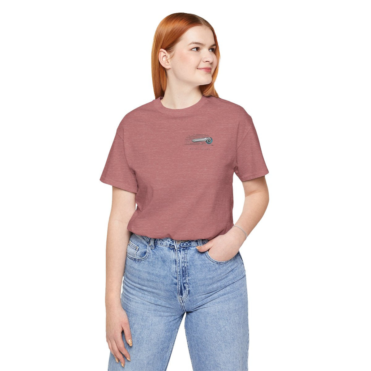 A Heather Mauve T-shirt featuring minimalist graphic of a sleek rotary cutter in motion with speed lines. Text below reads "RUNS WITH ROTARY CUTTERS" in a modern font.