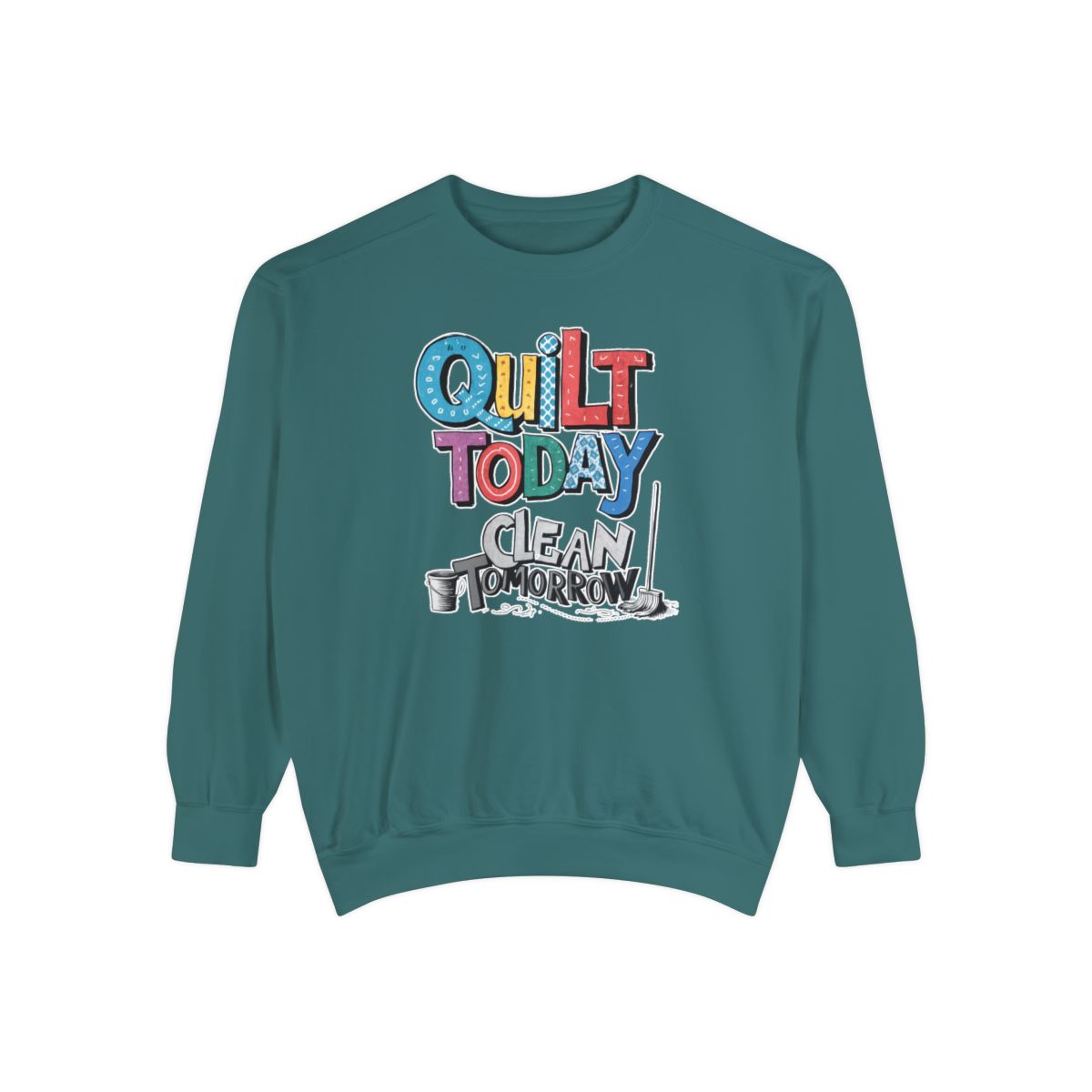 A Blue Spruce funny Sweatshirt with the phrase Quilt Today, Clean Tomorrow in a bold and cheerful font with a broom off to the side