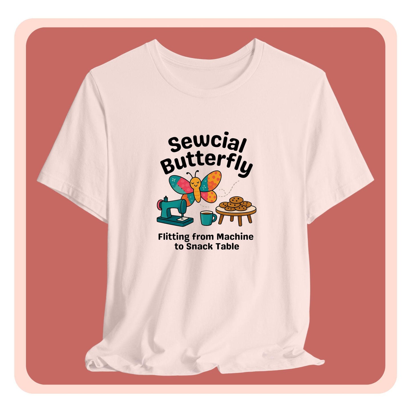 A A t-shirt with a colorful design showing a patchwork butterfly flying between a sewing machine and a table of cookies. Text reads “Sewcial Butterfly – Flitting from Machine to Snack Table.” Funny gift for quilters
