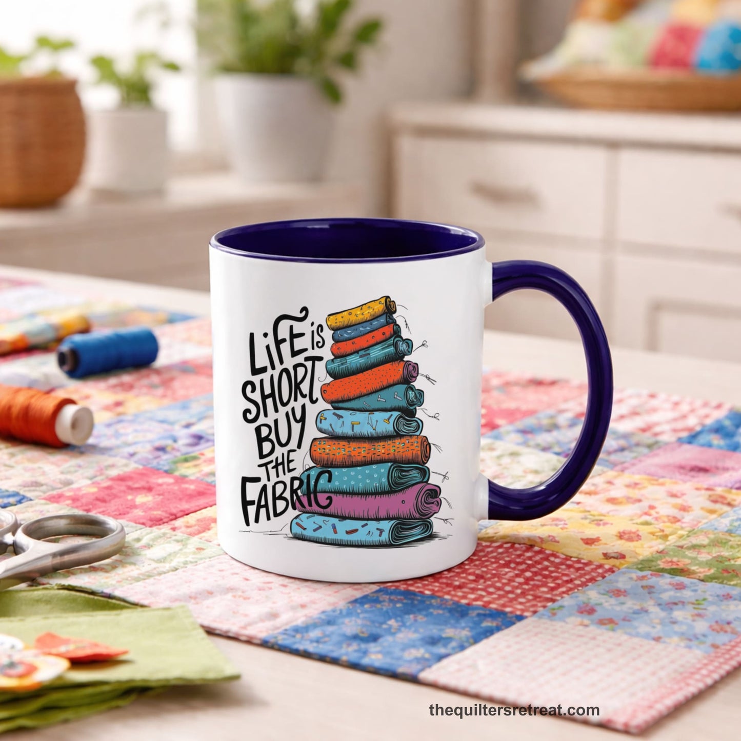 A Self-Fulfilled Accent Mug with a illustration of colorful fabric rolls with bold "Life is Short Buy the Fabric" text