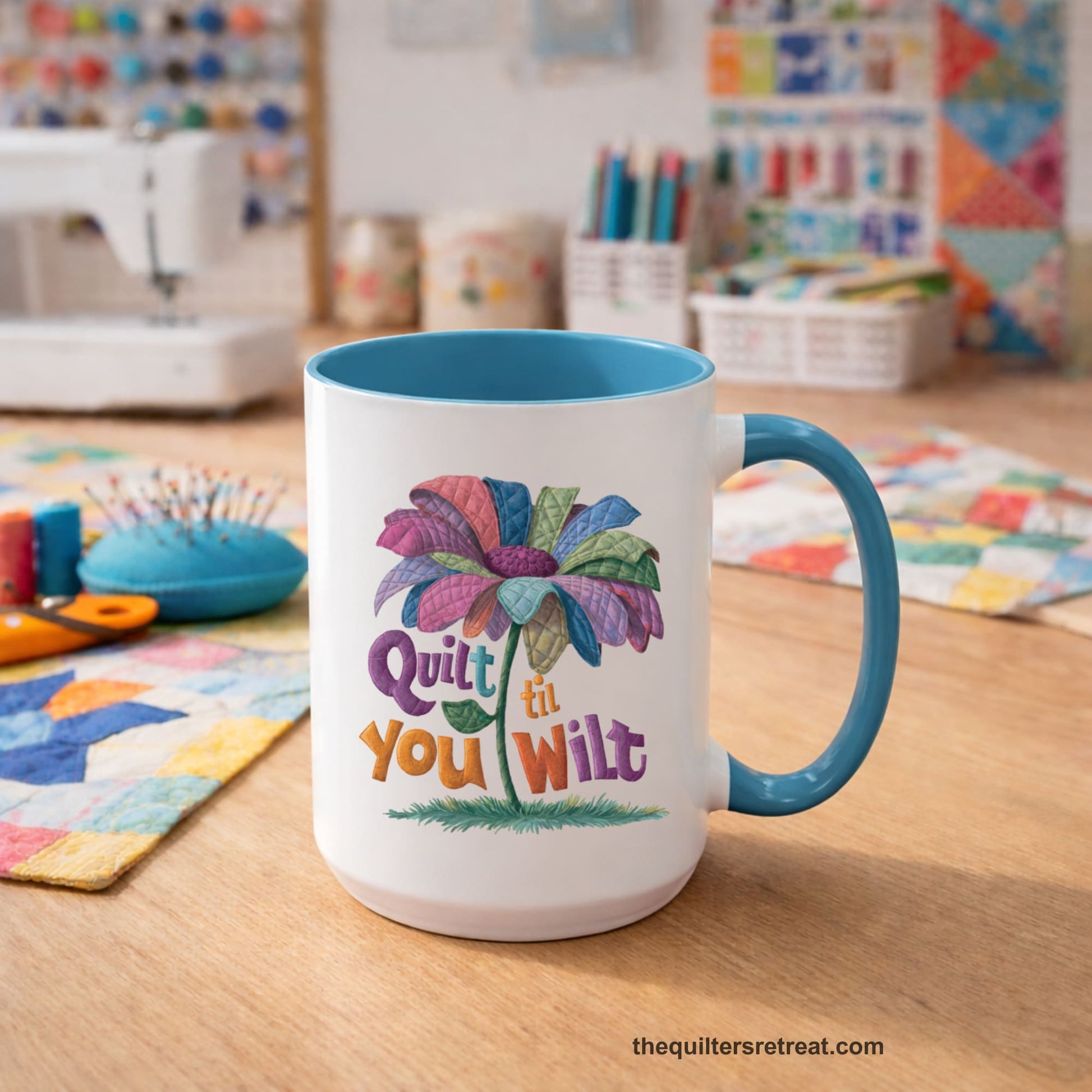 A Light Blue Self-Fulfilled Accent Mug with a whimsical quilted flower with bold "Quilt til You Wilt" text
