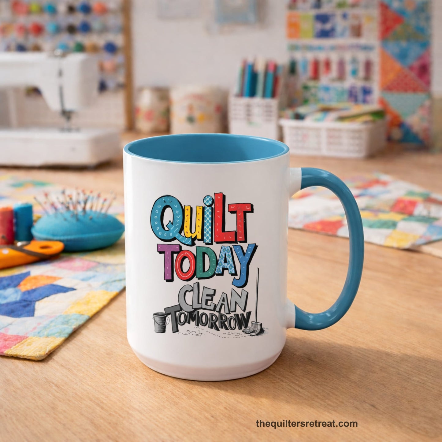 A Light Blue Self-Fulfilled Accent Mug with a playful "Quilt Today Clean Tomorrow" text with colorful patterns and cleaning tools illustration