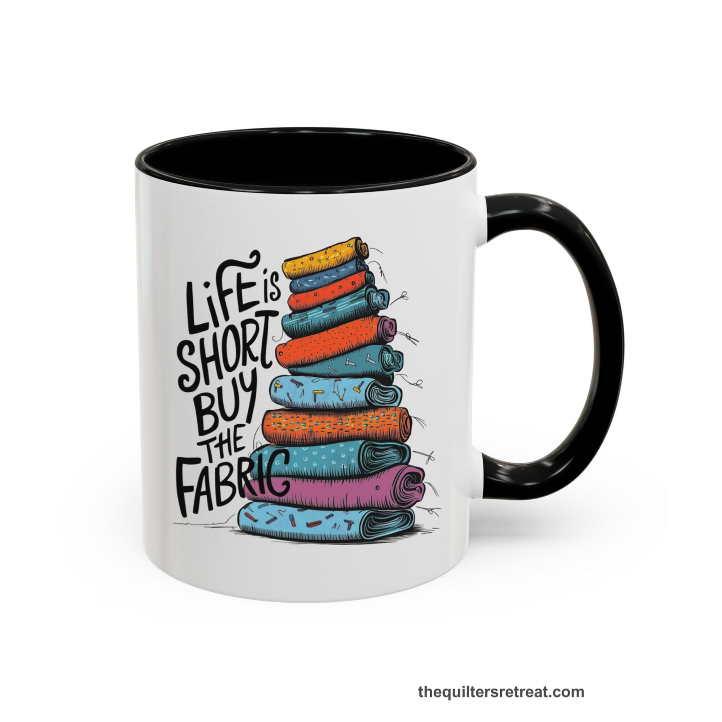 A Black Self-Fulfilled Accent Mug with a illustration of colorful fabric rolls with bold "Life is Short Buy the Fabric" text
