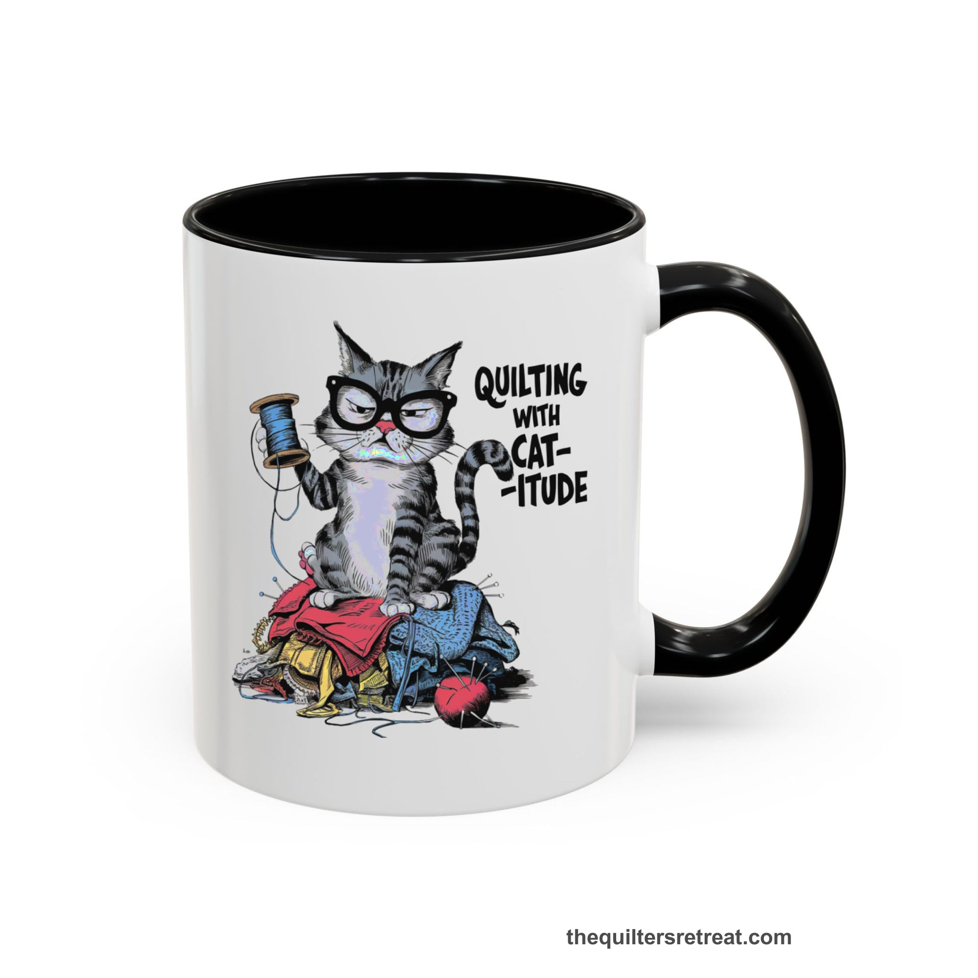 A Black Accent Ceramic Mug featuring Quilting with Catitude design with a grumpy cat holding thread spool atop fabric pile