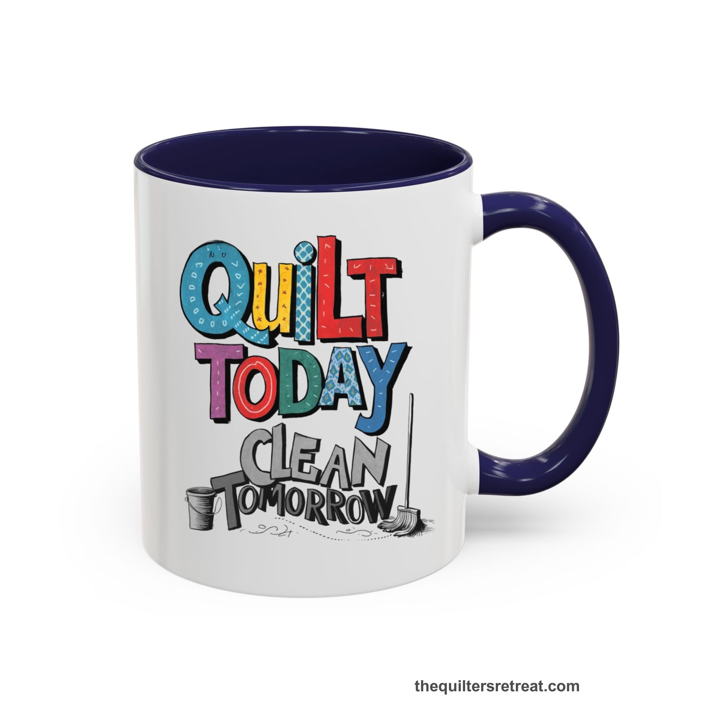 A Navy Self-Fulfilled Accent Mug with a playful "Quilt Today Clean Tomorrow" text with colorful patterns and cleaning tools illustration