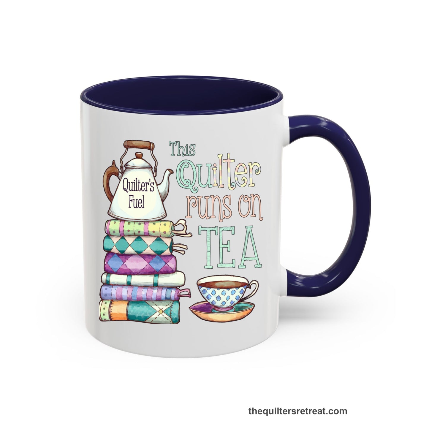 A Navy Self-Fulfilled Ceramic Accent Mug with a stack of colorful quilts with teapot and cup, whimsical "This Quilter Runs on Tea" text