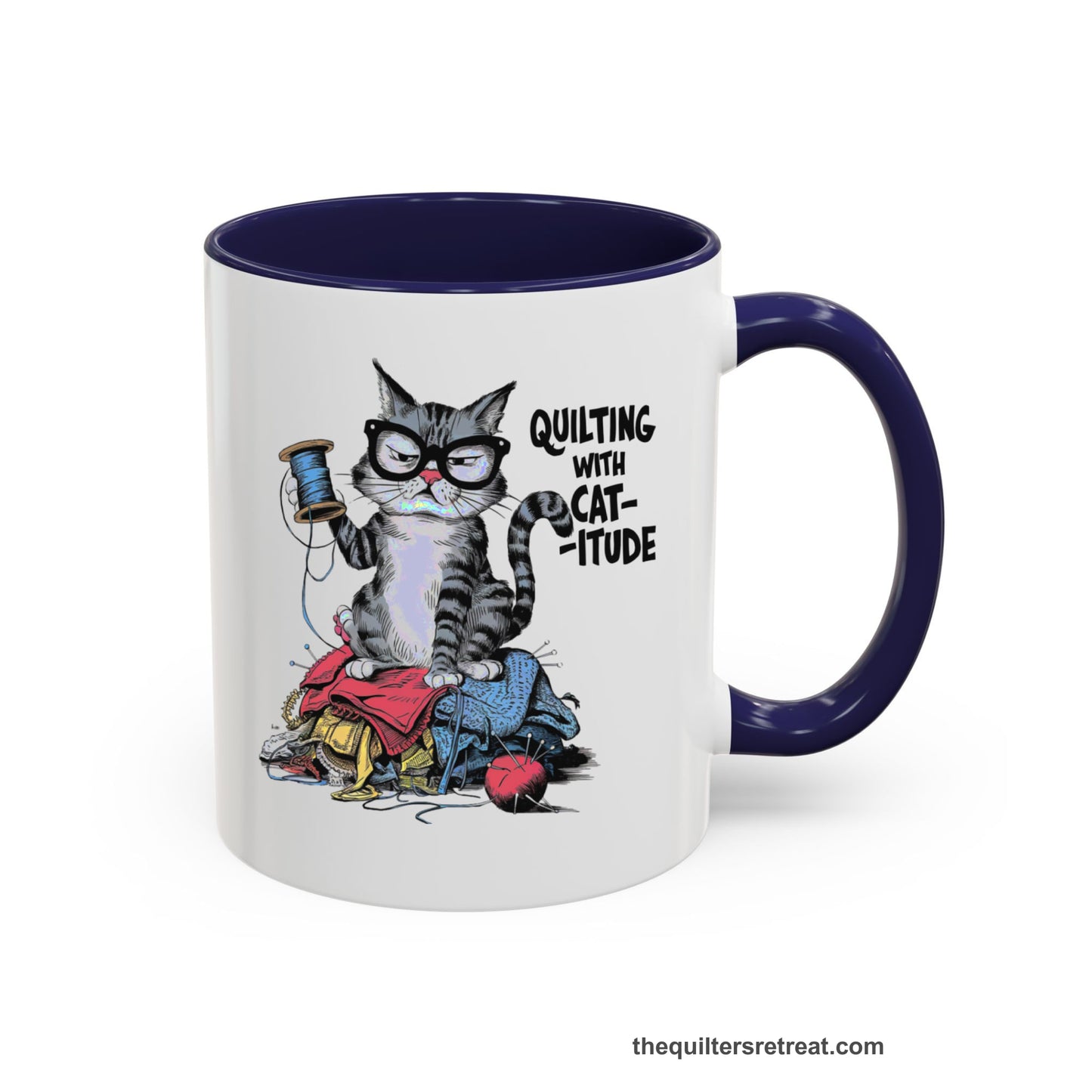 A Navy Accent Ceramic Mug featuring Quilting with Catitude design with a grumpy cat holding thread spool atop fabric pile