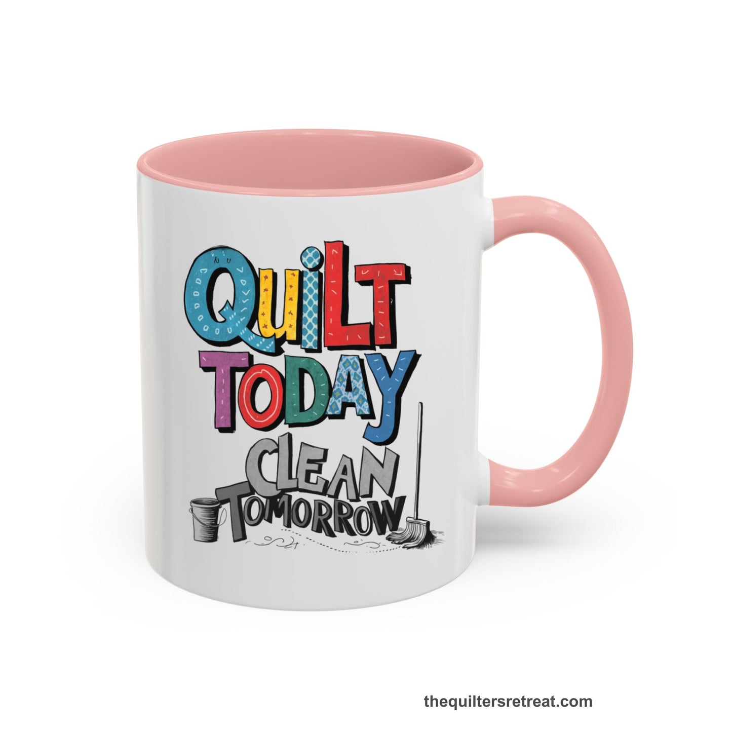 A Pink Self-Fulfilled Accent Mug with a playful "Quilt Today Clean Tomorrow" text with colorful patterns and cleaning tools illustration