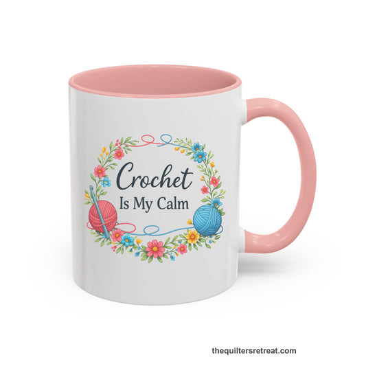 Crochet Gift: A Pink Ceramic Accent Mug with Yarn balls and flowers wreath with "Crochet Is My Calm" in elegant script.